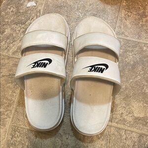 Nike White Slide Sandals with Black Logo